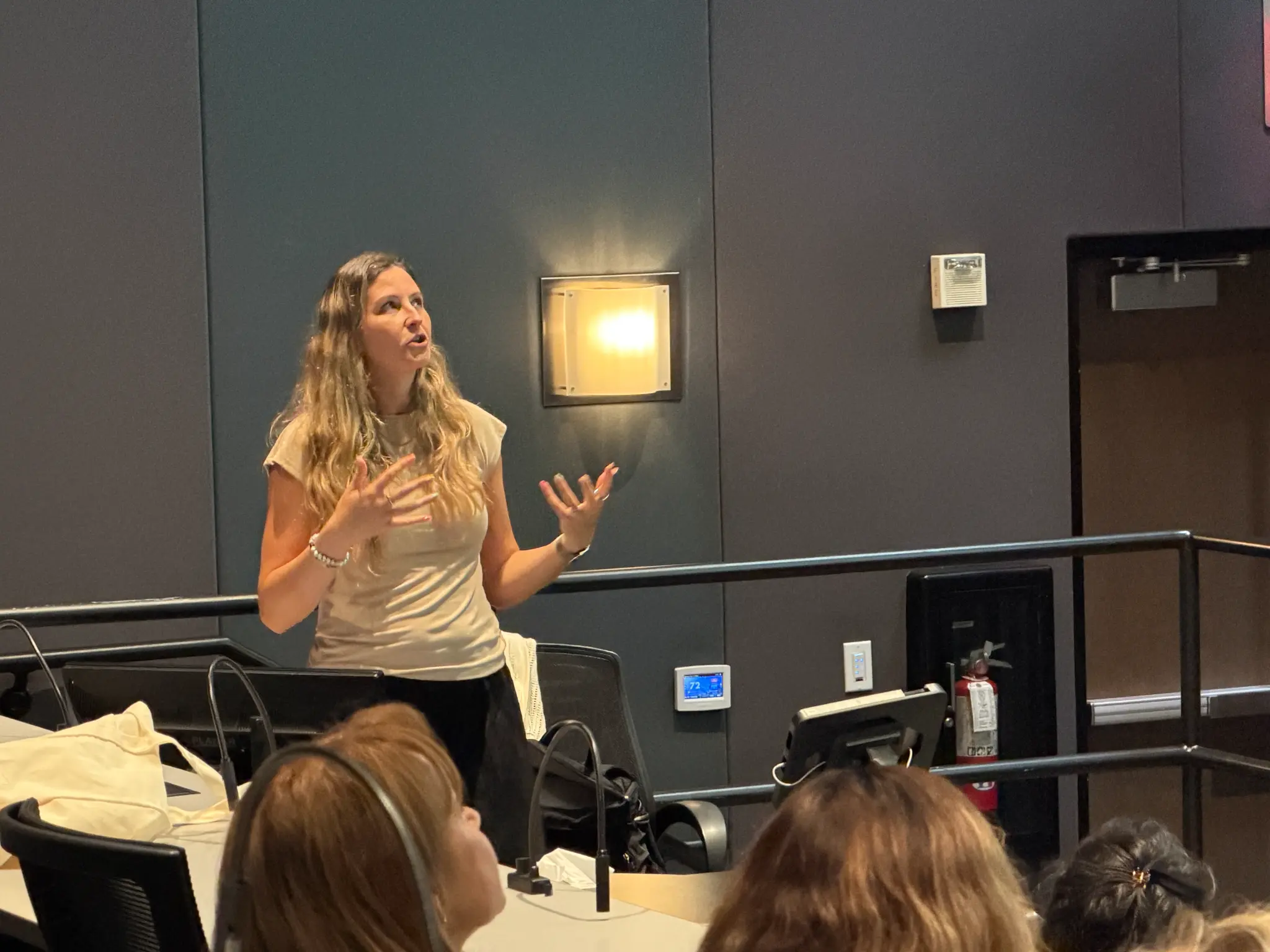 Jackie Hackett speaking at a corporate wellness workshop
