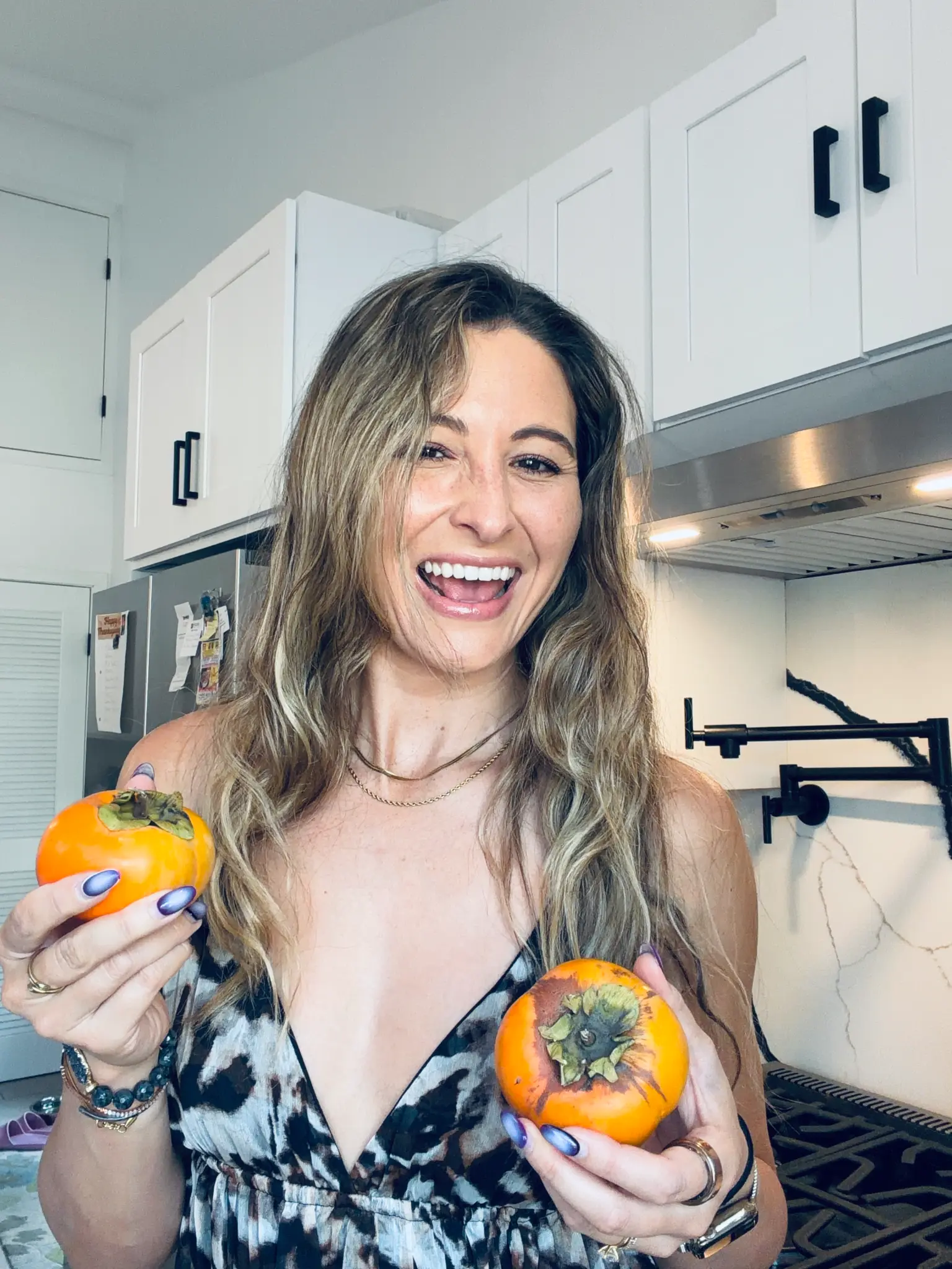 Jackie with persimmons